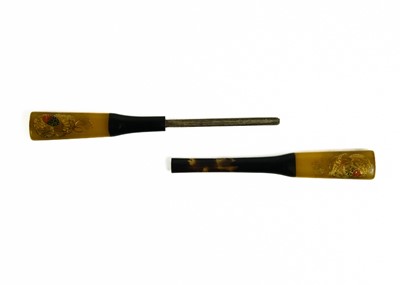 Lot 495 - Twenty Japanese black and mainly gilt laquer kogai, 19th/20th century.