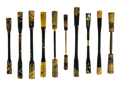 Lot 495 - Twenty Japanese black and mainly gilt laquer kogai, 19th/20th century.