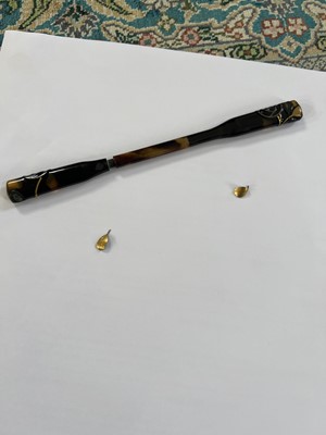 Lot 495 - Twenty Japanese black and mainly gilt laquer kogai, 19th/20th century.