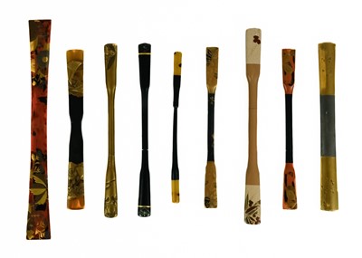 Lot 1023 - Eighteen Japanese lacquer kogai, 19th/20th century.