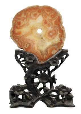 Lot 1043 - A Chinese wood carved stand, Qing Dynasty, 19th century.