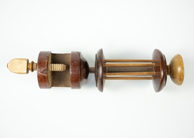 Lot 325 - A Victorian treen winding clamp.