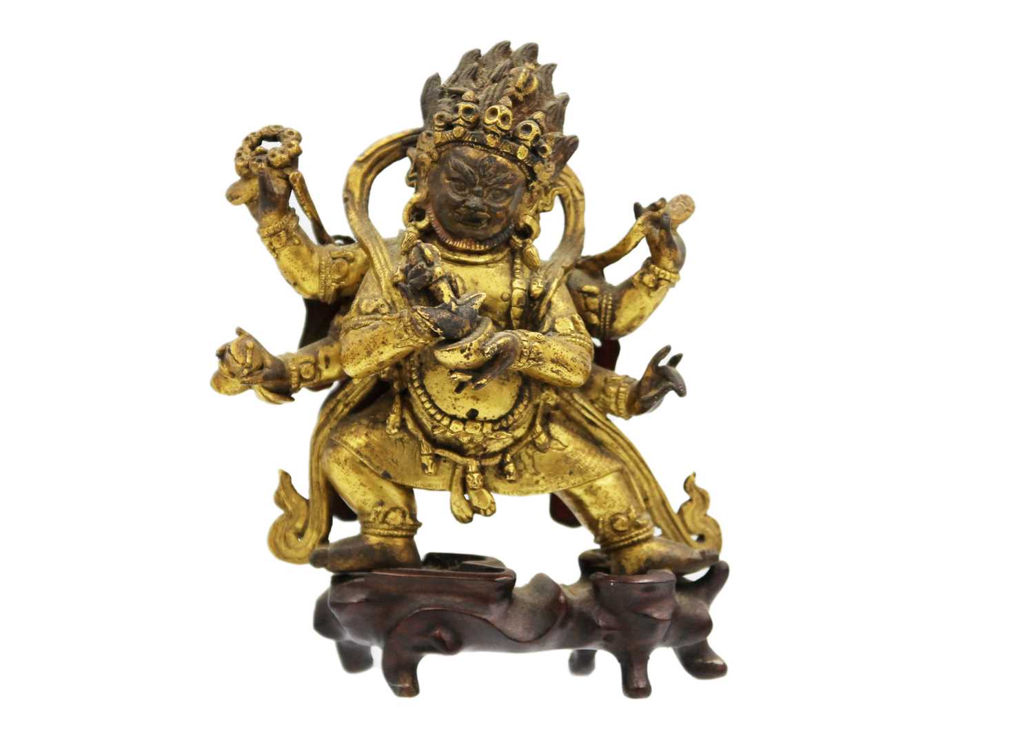 Lot 81 - A Sino-Tibetan gilt bronze figure of Mahakala, 18th/19th century.