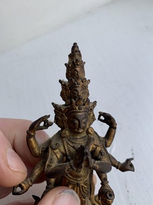 Lot 82 - A Sino-Tibetan gilt bronze figure of Avalokitesvara, 18th/19th century.