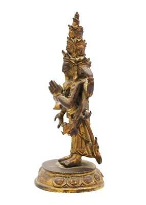 Lot 82 - A Sino-Tibetan gilt bronze figure of Avalokitesvara, 18th/19th century.