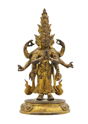 Lot 82 - A Sino-Tibetan gilt bronze figure of Avalokitesvara, 18th/19th century.