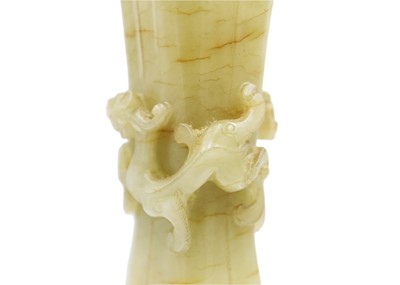 Lot 84 - A Chinese pale green jade Gu vase, early Qing Dynasty.