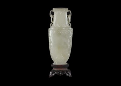 Lot 86 - A Chinese grey-green jade vase, Qing Dynasty, 18th/19th century.