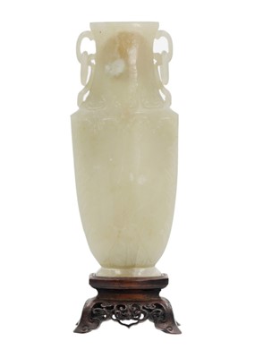 Lot 86 - A Chinese grey-green jade vase, Qing Dynasty, 18th/19th century.