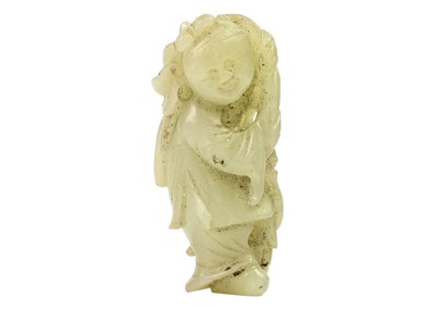 Lot 524 - A Chinese carved jade figure of a boy, Qing Dynasty, 19th century