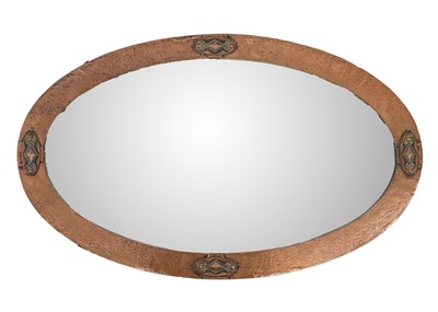 Lot 302 - An Arts and Crafts copper frame oval mirror.