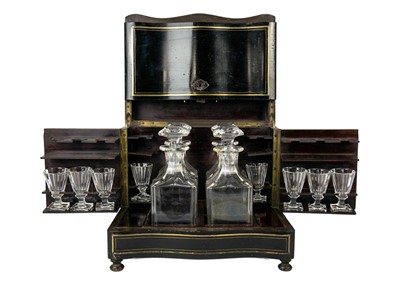 Lot 266 - A 19th century French ebonised and rosewood table top liqueur casket.