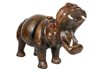 Lot 259 - A leather clad model hippo.