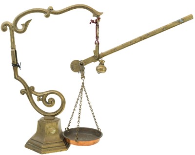 Lot 176 - An early 20th century brass balance scales