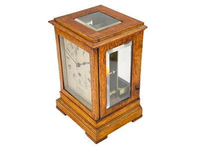 Lot 574 - A Charles Frodsham oak four-glass library timepiece.