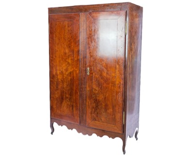 Lot 574 - An early 20th century French fruit wood wardrobe.