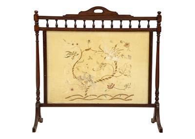 Lot 664 - An Edwardian walnut wide fire screen.