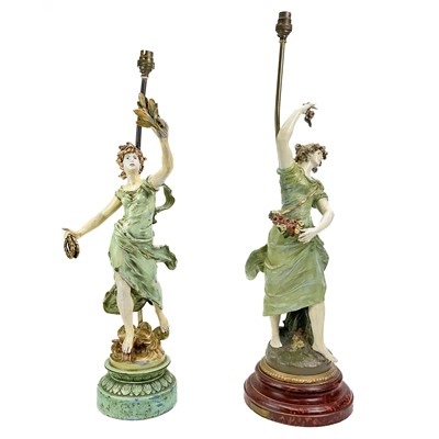 Lot 87 - A pair of early 20th century painted spelter table lamps.