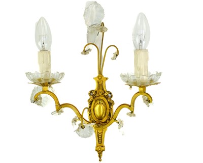 Lot 73 - A pair of gilt metal twin branch wall lights.