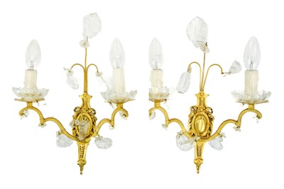 Lot 73 - A pair of gilt metal twin branch wall lights.