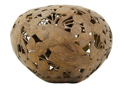 Lot 1037 - A carved coconut, Bali, Indonesia.