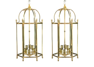 Lot 74 - A pair of glazed brass hexagonal hall lanterns.