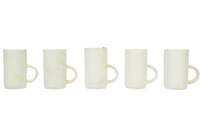 Lot 49 - A set of eight Troika biscuit pottery coffee mugs.