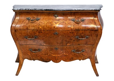 Lot 627 - A French Louis XV style figured walnut and inlaid bombe fronted commode.