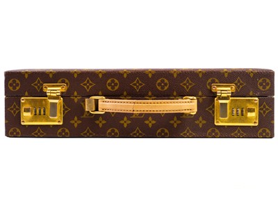 Lot 348 - LOUIS VUITTON - A monogram briefcase with combination locks.
