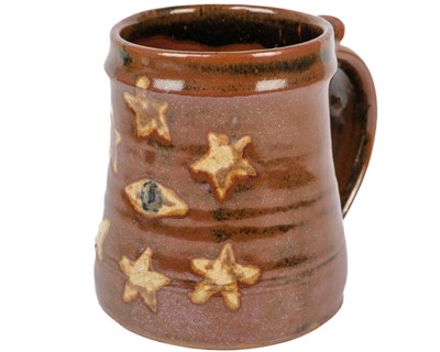 Lot 511 - Trevor Corser, a Leach pottery mug.