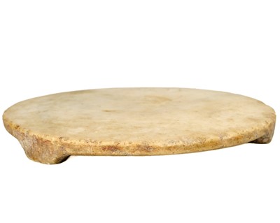 Lot 82 - An Indian marble chapati board, early 20th century.