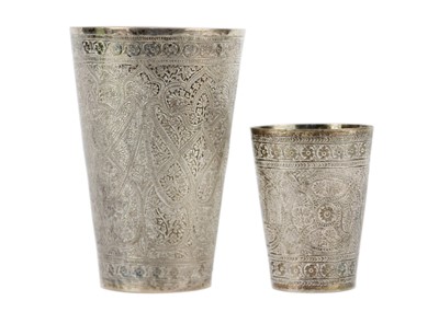 Lot 91 - Two Indian silver floral decorated beakers, circa 1900.