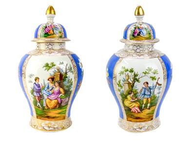 Lot 483 - A pair of German porcelain baluster vases and covers.