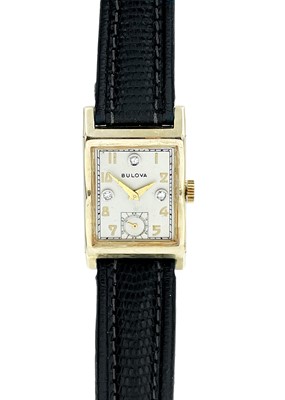 Lot 139 - BULOVA - An Art Deco 14ct cased lady's manual wind dress watch with diamond markers.