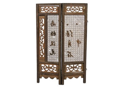 Lot 577 - A Chinese carved wood eight paneled screen, early 20th century.
