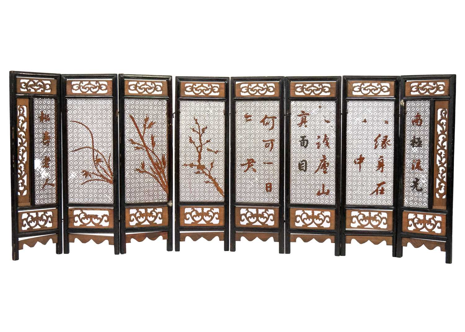 Lot 577 - A Chinese carved wood eight paneled screen, early 20th century.
