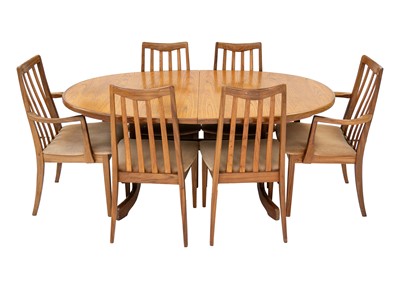Lot 43 - A mid century  G Plan teak oval extending dining table.