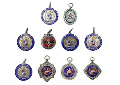 Lot 83 - A collection of ten silver and enamel football fobs.