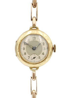 Lot 234 - An early 20th century 18ct lady's manual wind wristwatch with 15ct expanding bracelet.