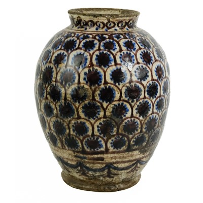 Lot 107 - A Persian pottery glazed vase, 16th century.
