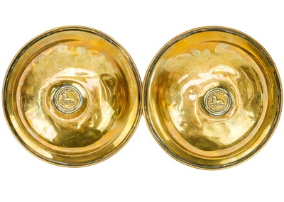 Lot 41 - A pair of European hexagonal brass candlesticks.