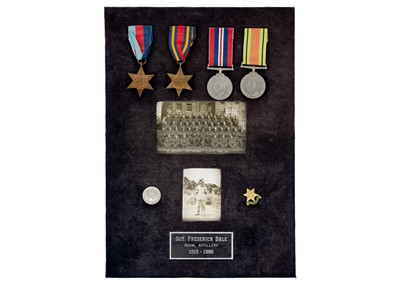 Lot 201 - WWII Medal Group of four plus photo and badges