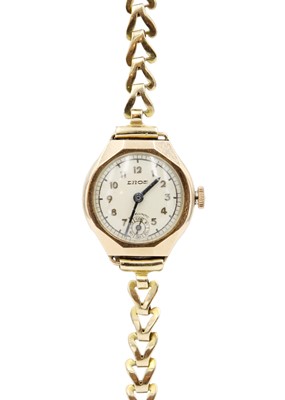 Lot 240 - A 9ct lady's manual wind bracelet wristwatch.