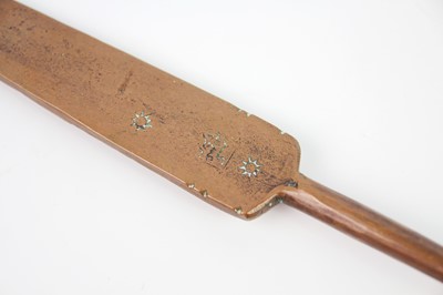 Lot 114 - A Middle Eastern copper ladle, early 20th century.