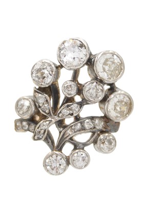 Lot 130 - An attractive late 19th-century continental diamond set foliate spray design ring.