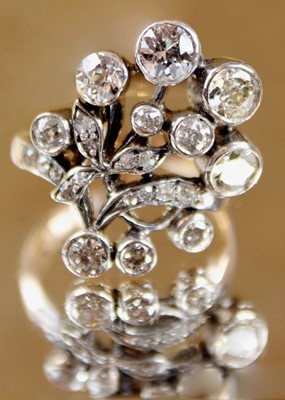 Lot 130 - An attractive late 19th-century continental diamond set foliate spray design ring.