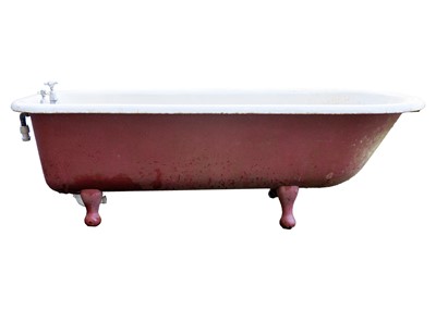 Lot 97 - A cast iron roll top bath.