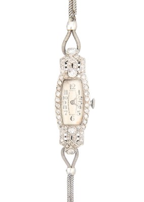 Lot 136 - A diamond set white gold cased lady's cocktail bracelet wristwatch.