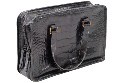 Lot 336 - A Prada black crocodile skin handbag.