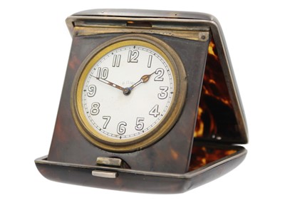 Lot 199 - A Bulova gold-plated manual wind gentleman's wristwatch and a travel clock.